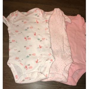 Three 0-3 month onesies